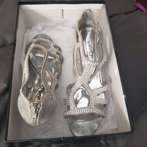 Silver strappy sandals with rhinestone edging